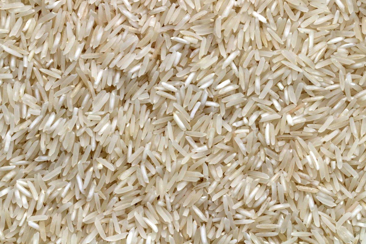 Uncooked long-grain basmati rice grains